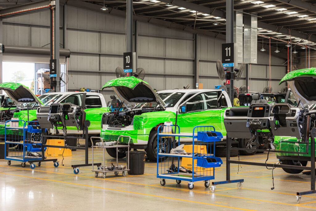 Ford F-150 Lightnings being remanufactured to right-hand drive in AMQ's state-of-the-art facility.